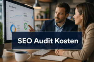 Zwei Personen sitzen an einem Schreibtisch und blicken auf einen Computerbildschirm, auf dem SEO-Analysen und Diagramme angezeigt werden, während sie ein professionelles Audit durchführen. Ein Text-Overlay lautet: SEO-Audit-Kosten – Audit 2026.
